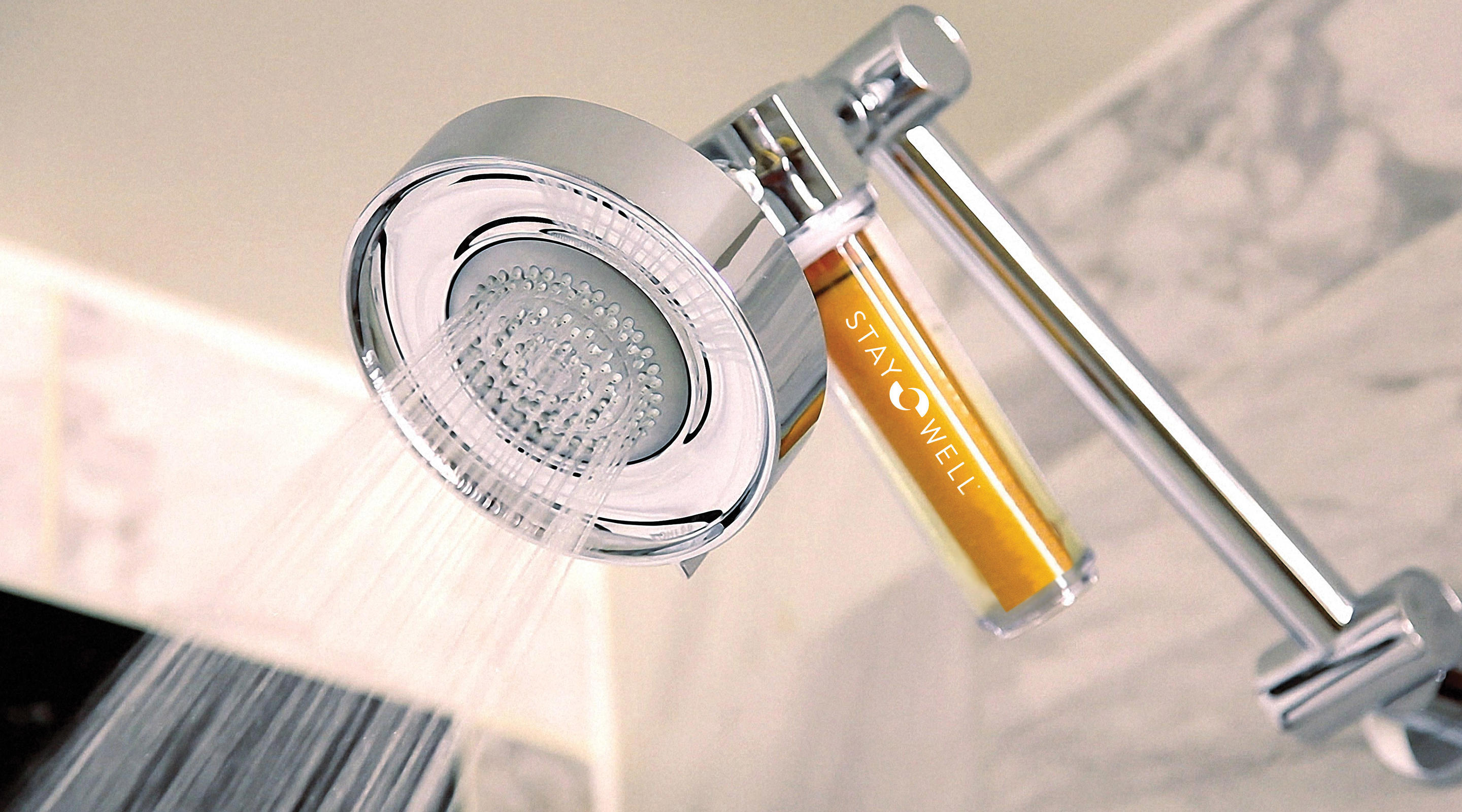 Shower infuser inside Stay Well bathrooms.